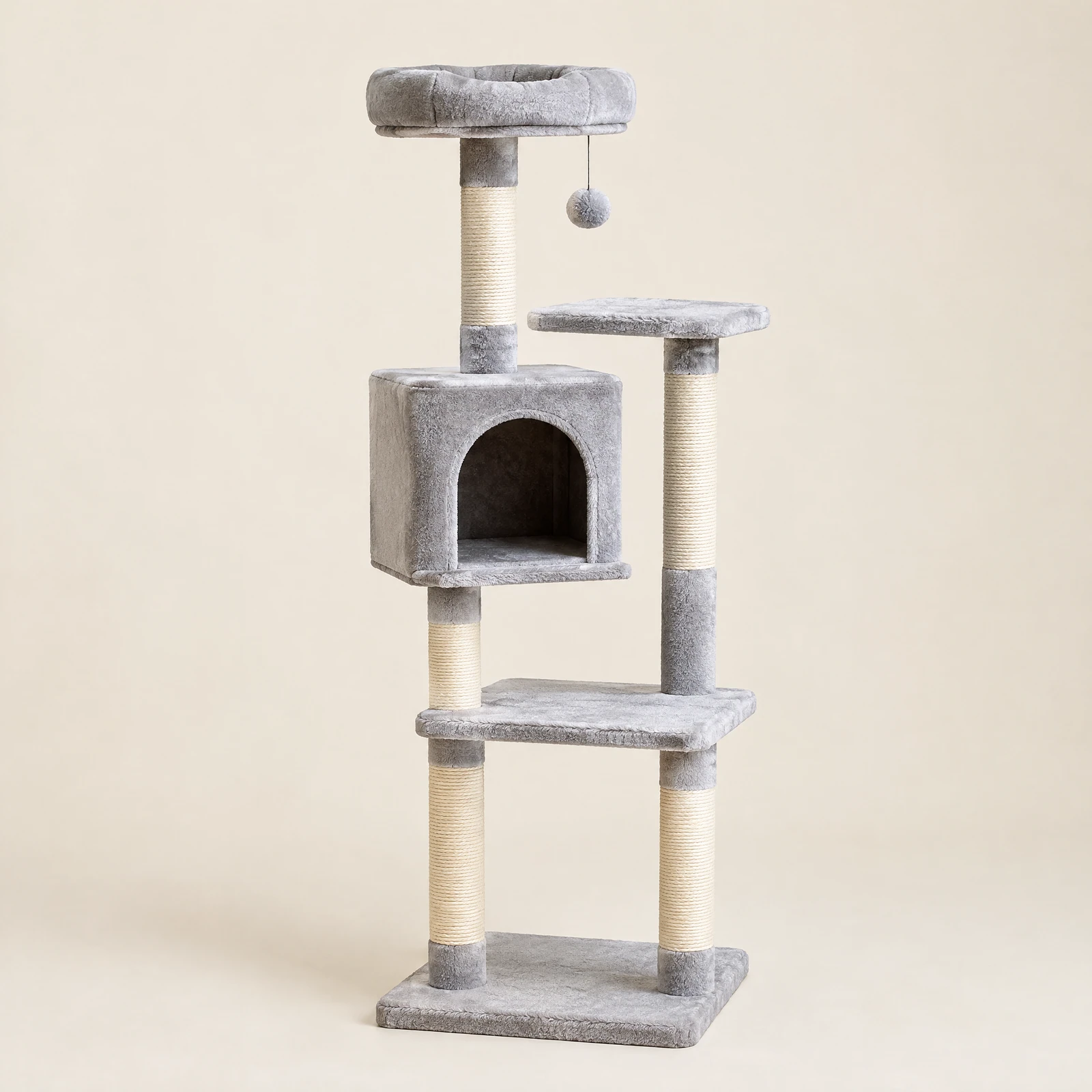 A tall light gray plush cat tree with rope-wrapped posts, a cubby and a top perch bed, empty, on a cream background